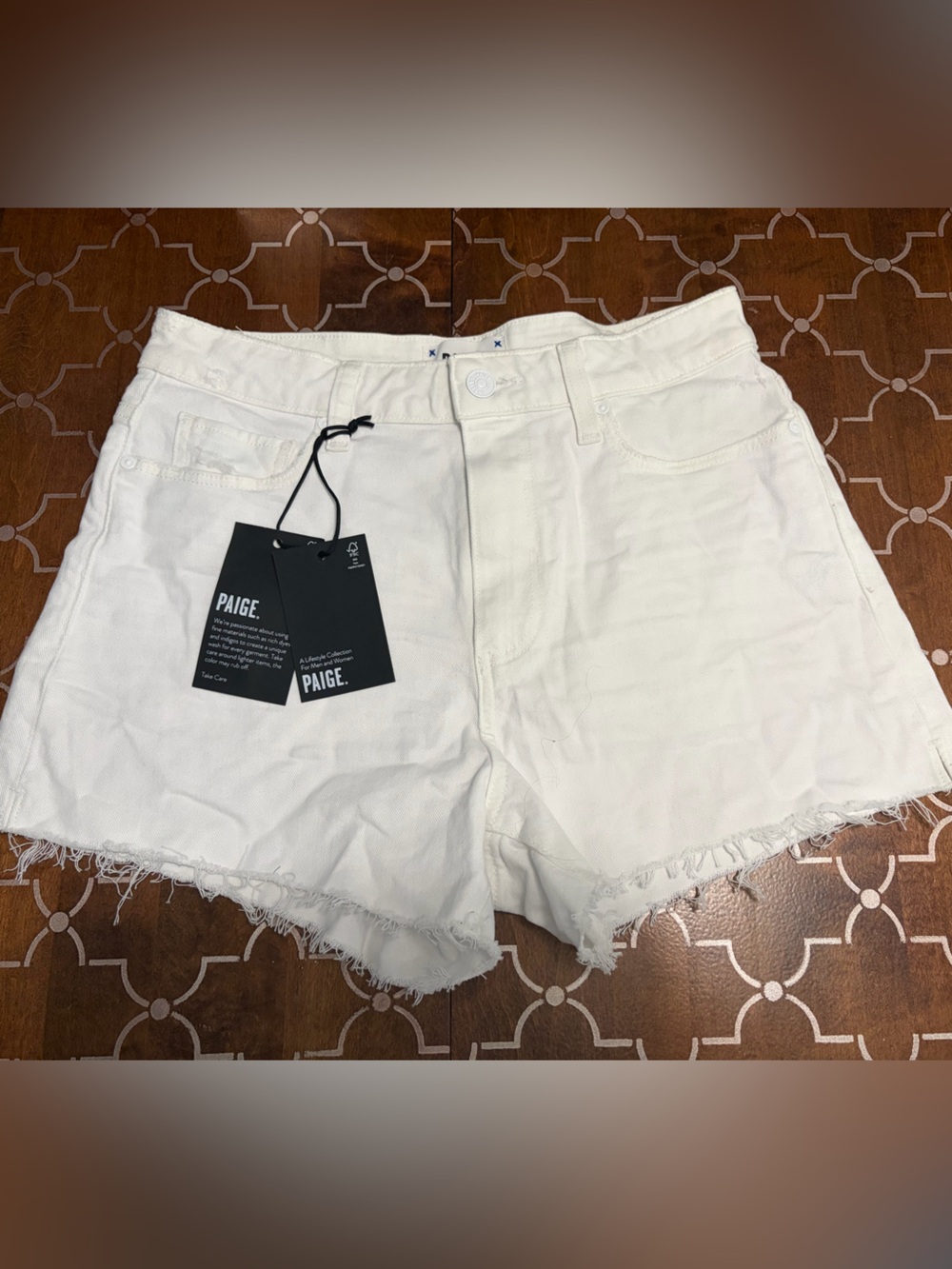 PAIGE White Frayed Denim Cutoff Shorts